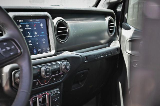 used 2023 Jeep Wrangler car, priced at $12,980