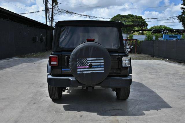 used 2023 Jeep Wrangler car, priced at $12,980