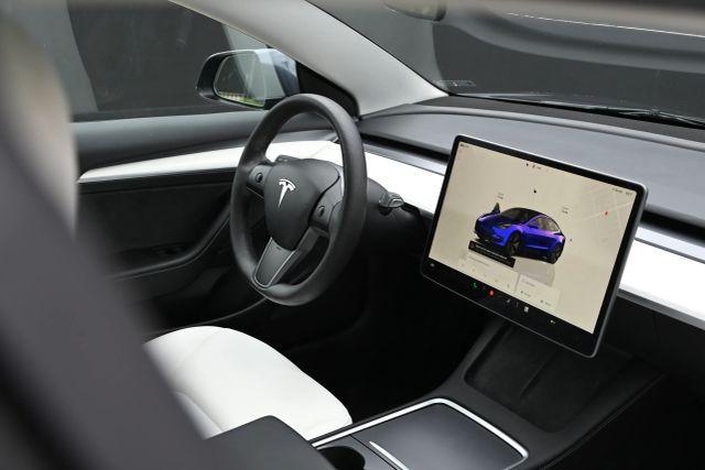 used 2023 Tesla Model 3 car, priced at $11,980