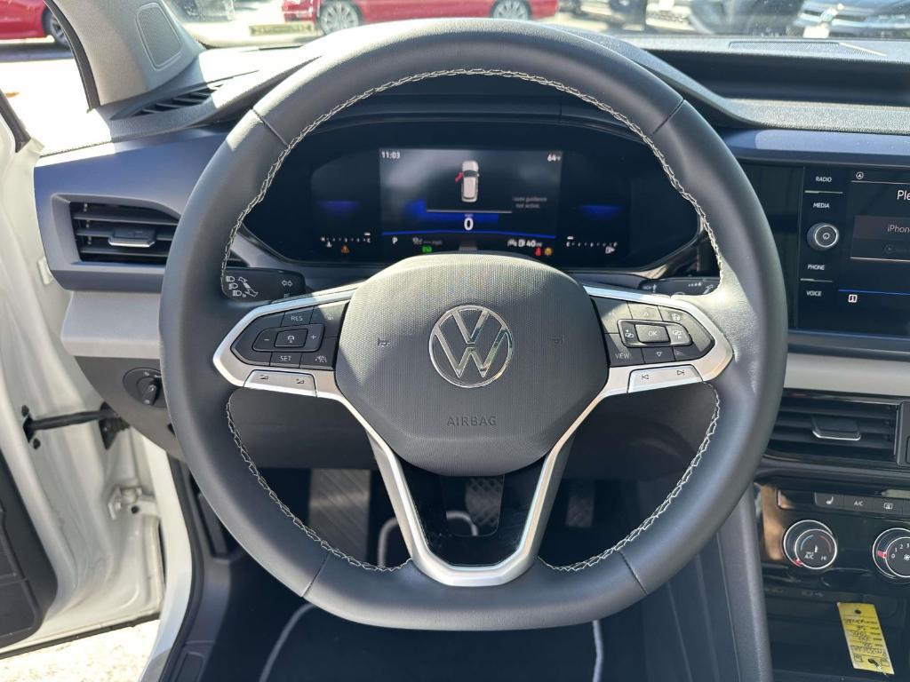 used 2023 Volkswagen Taos car, priced at $20,850
