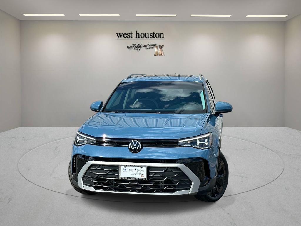 used 2025 Volkswagen Taos car, priced at $24,450