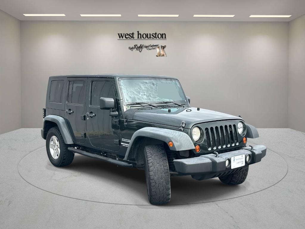 used 2010 Jeep Wrangler Unlimited car, priced at $12,450