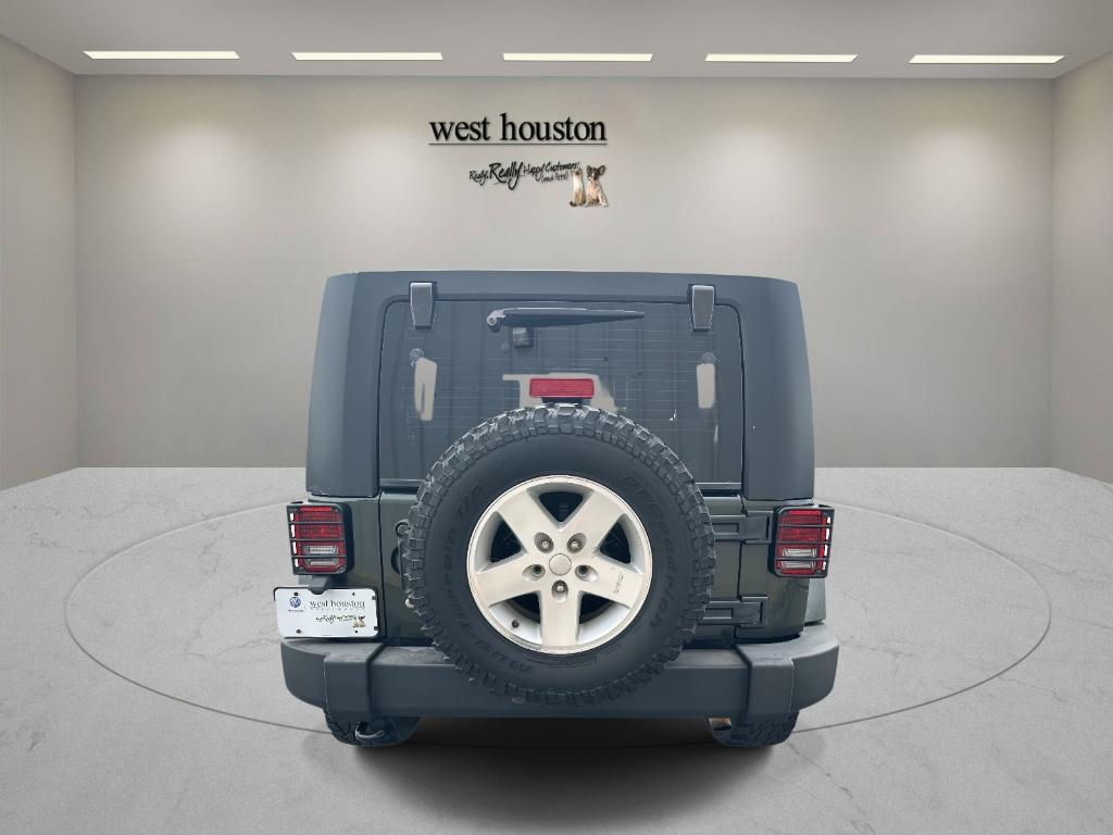 used 2010 Jeep Wrangler Unlimited car, priced at $12,450