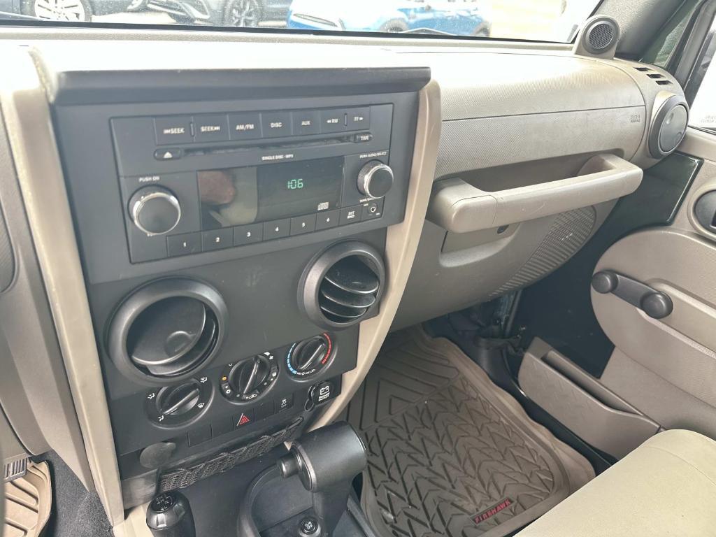 used 2010 Jeep Wrangler Unlimited car, priced at $12,450