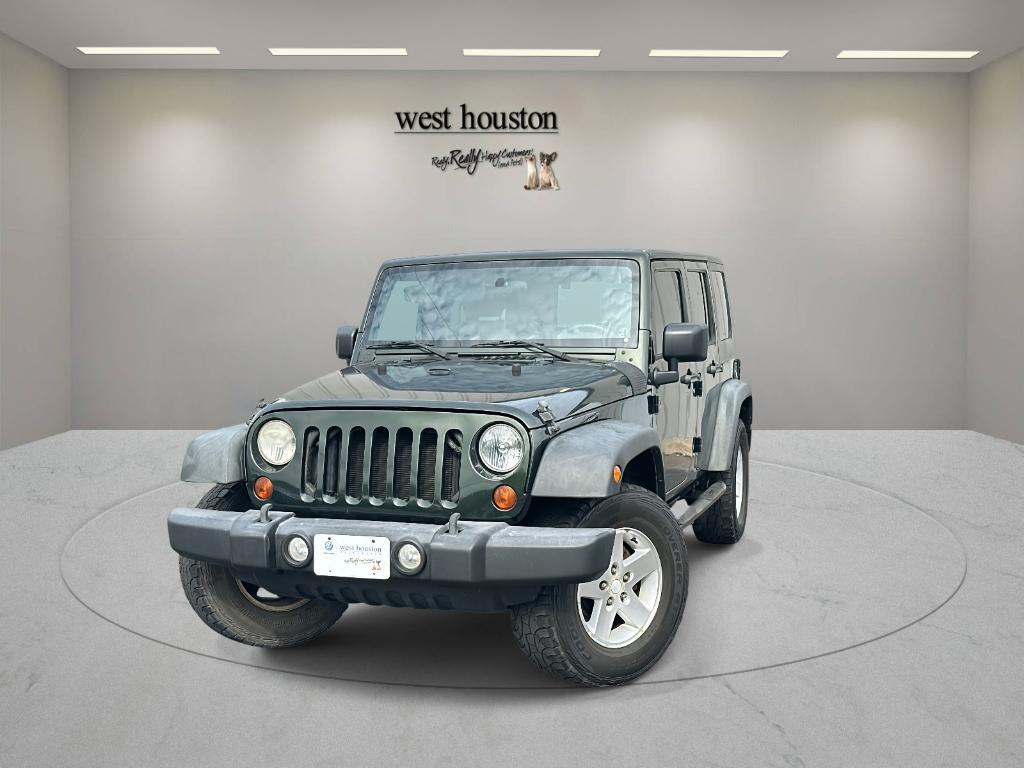used 2010 Jeep Wrangler Unlimited car, priced at $12,450