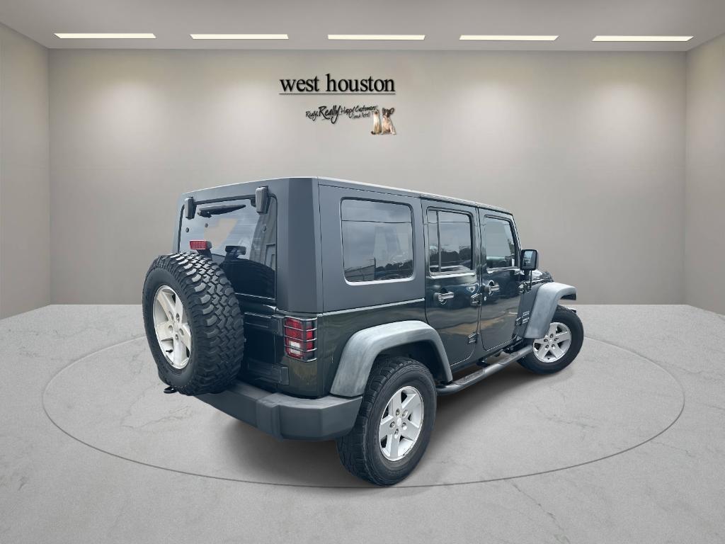 used 2010 Jeep Wrangler Unlimited car, priced at $12,450