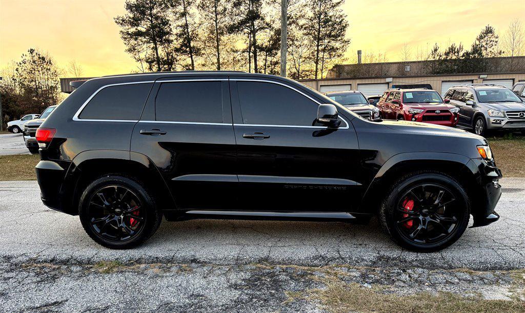 used 2014 Jeep Grand Cherokee car, priced at $23,995