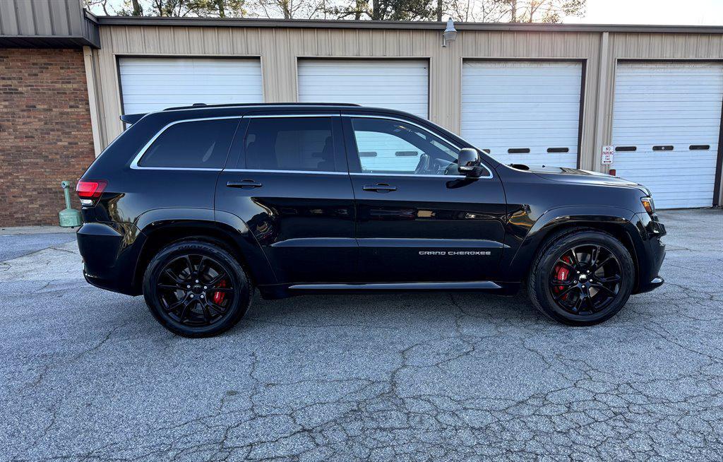 used 2014 Jeep Grand Cherokee car, priced at $25,995