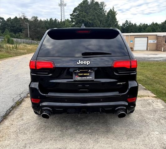 used 2015 Jeep Grand Cherokee car, priced at $24,995