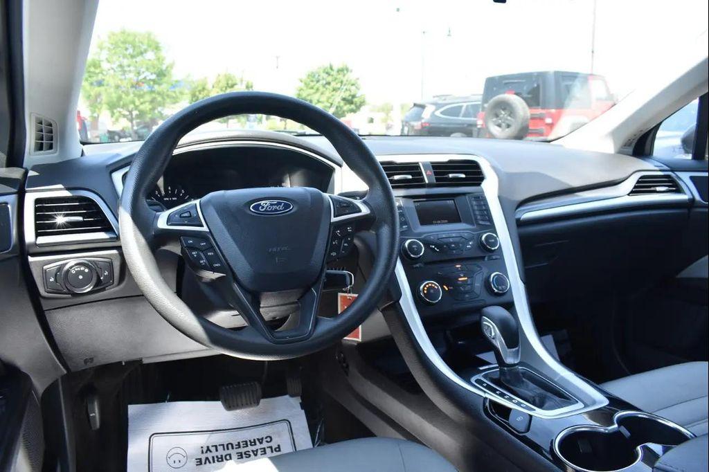 used 2015 Ford Fusion car, priced at $10,497