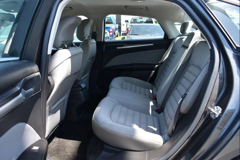 used 2015 Ford Fusion car, priced at $10,497