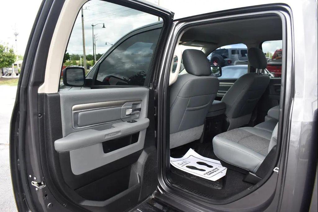 used 2018 Ram 1500 car, priced at $24,297