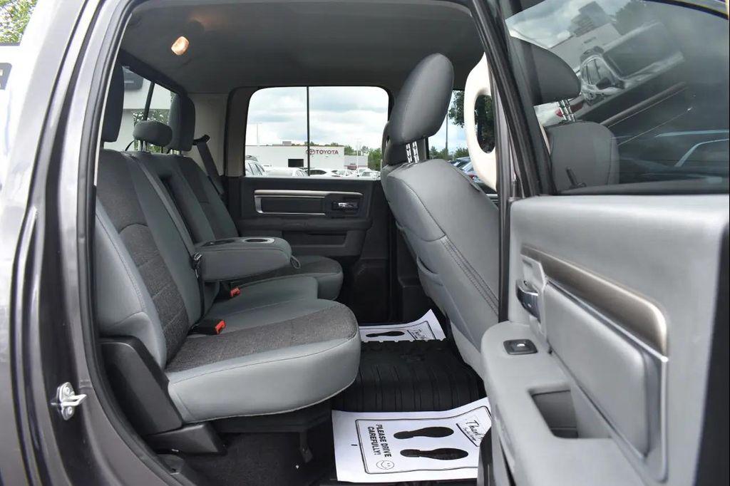 used 2018 Ram 1500 car, priced at $24,297