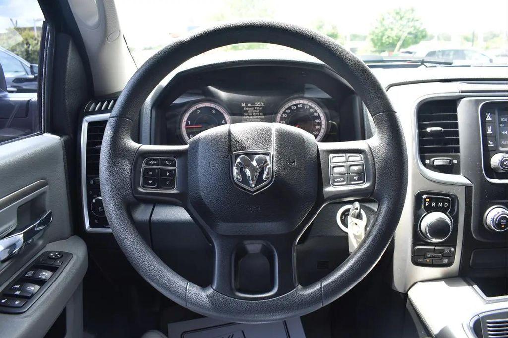 used 2018 Ram 1500 car, priced at $24,297