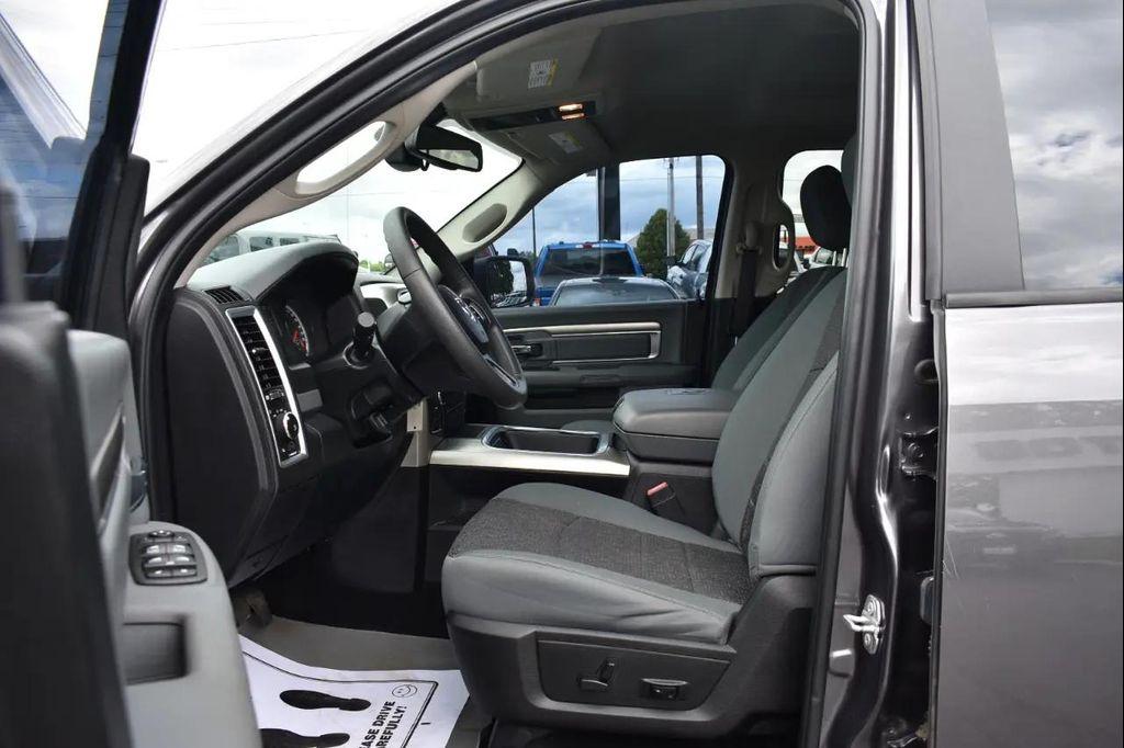 used 2018 Ram 1500 car, priced at $24,297