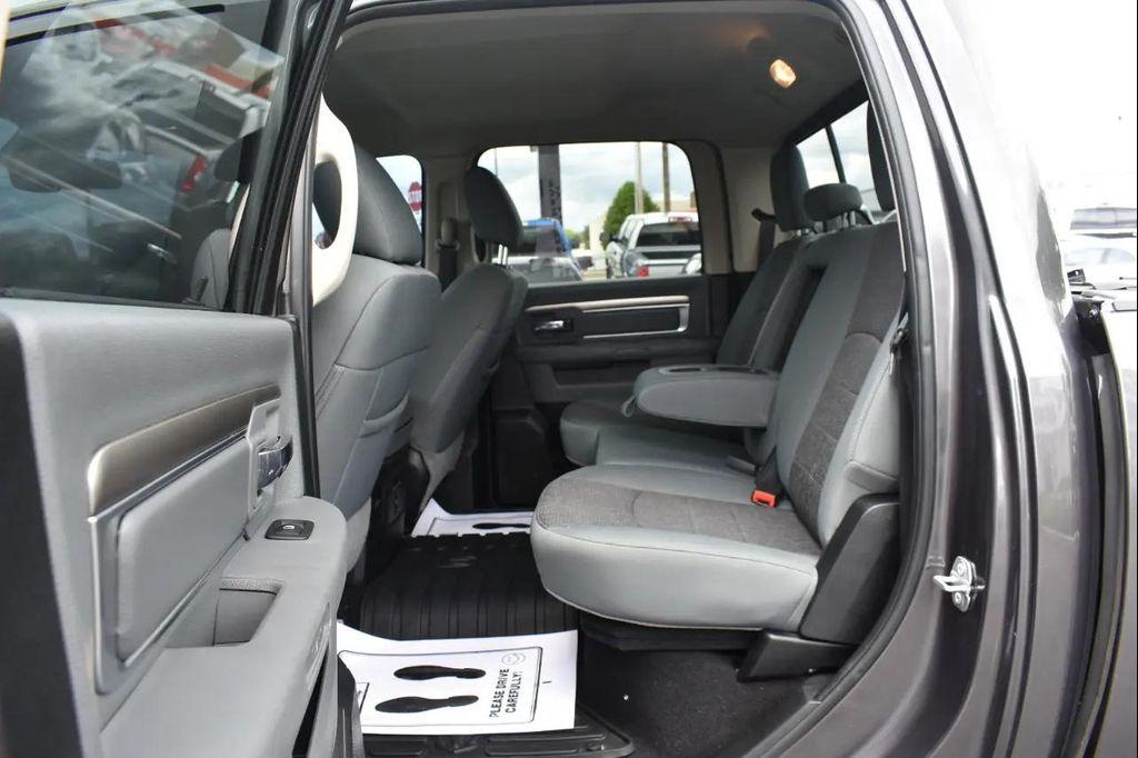 used 2018 Ram 1500 car, priced at $24,297