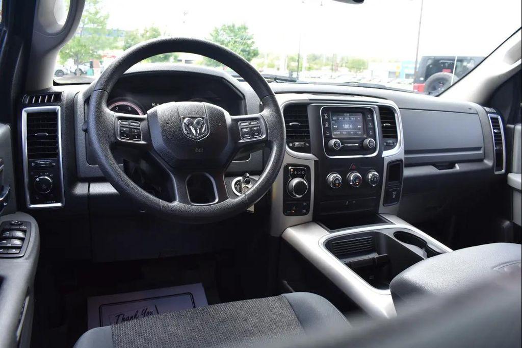used 2018 Ram 1500 car, priced at $24,297