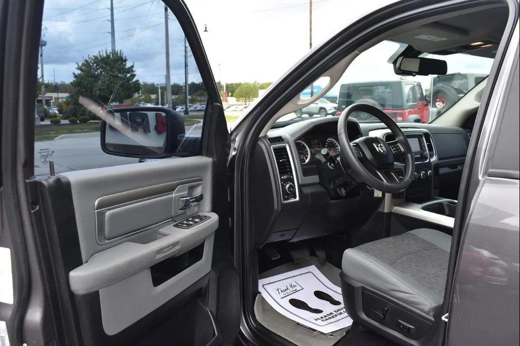 used 2018 Ram 1500 car, priced at $24,297