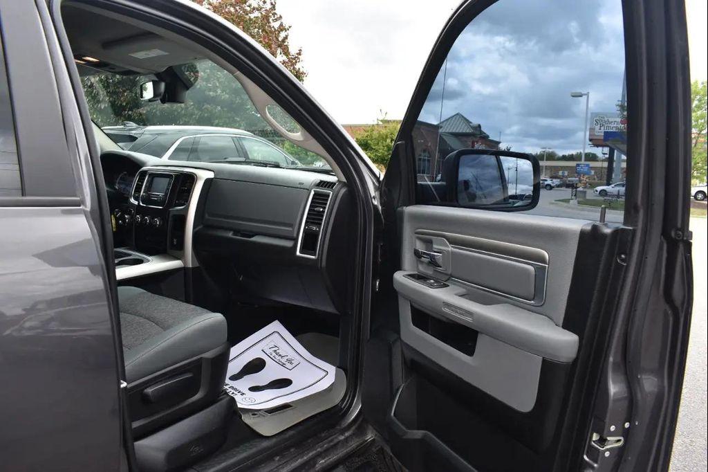 used 2018 Ram 1500 car, priced at $24,297