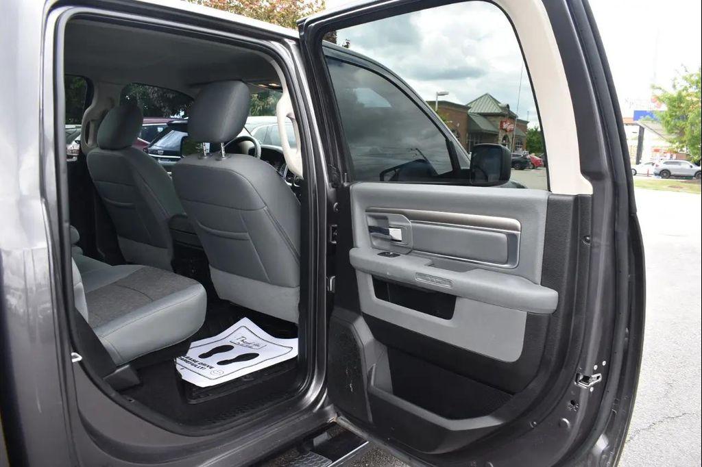 used 2018 Ram 1500 car, priced at $24,297
