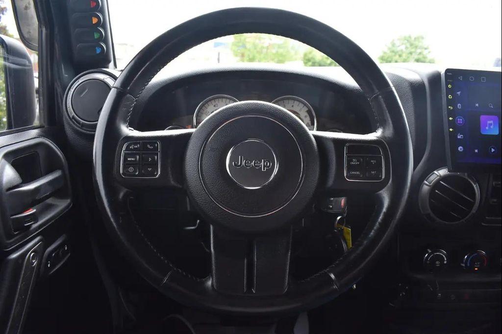 used 2015 Jeep Wrangler Unlimited car, priced at $17,997