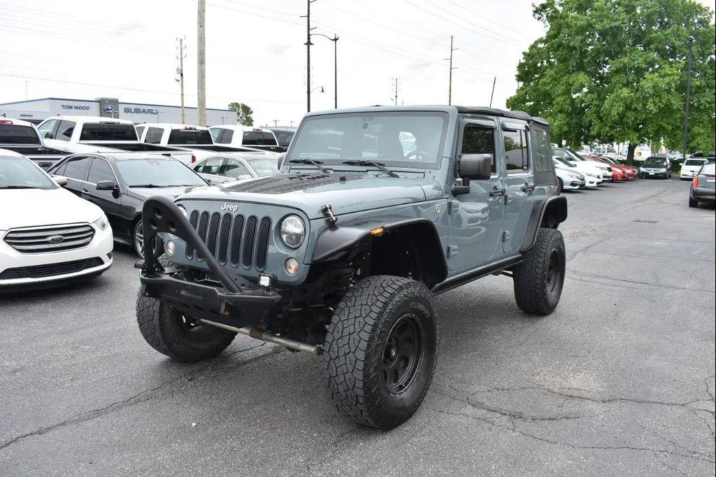 used 2015 Jeep Wrangler Unlimited car, priced at $17,997