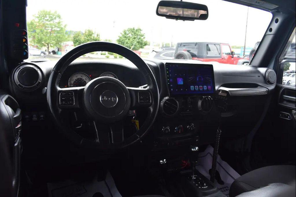 used 2015 Jeep Wrangler Unlimited car, priced at $17,997
