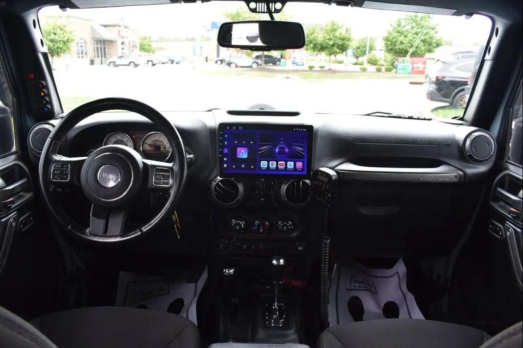 used 2015 Jeep Wrangler Unlimited car, priced at $17,997