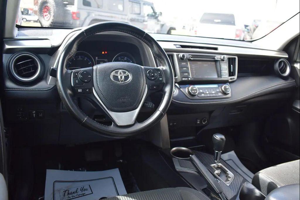 used 2018 Toyota RAV4 car, priced at $21,297