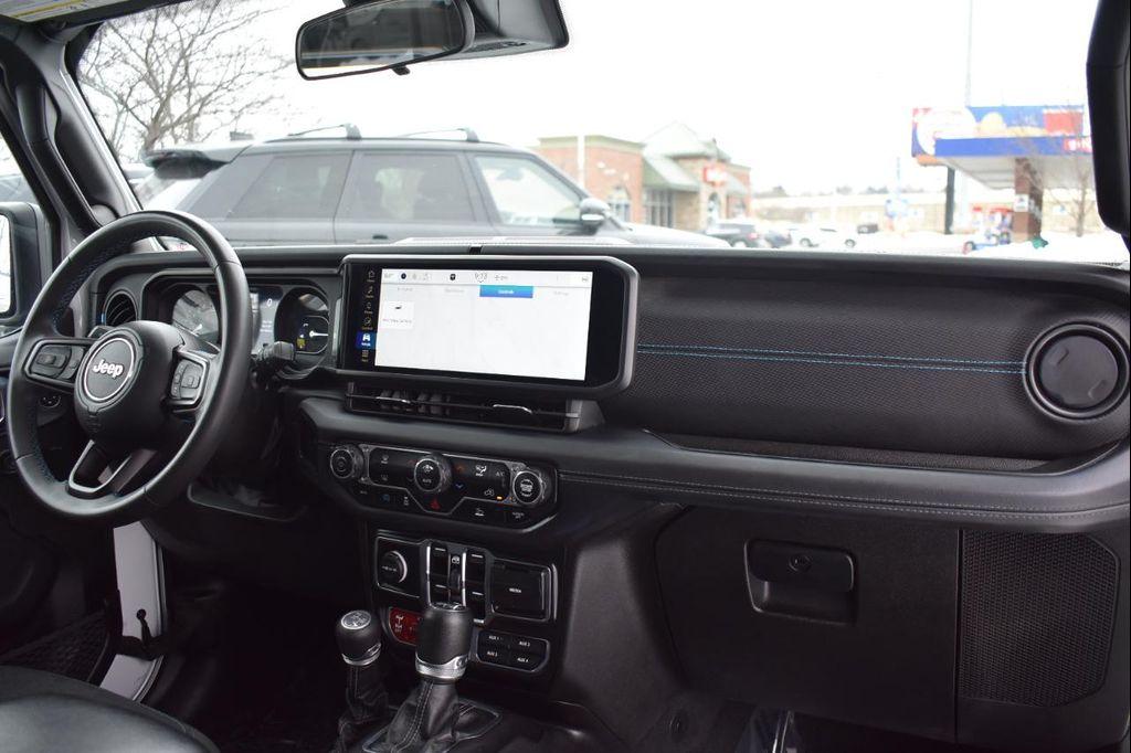 used 2024 Jeep Wrangler 4xe car, priced at $29,497
