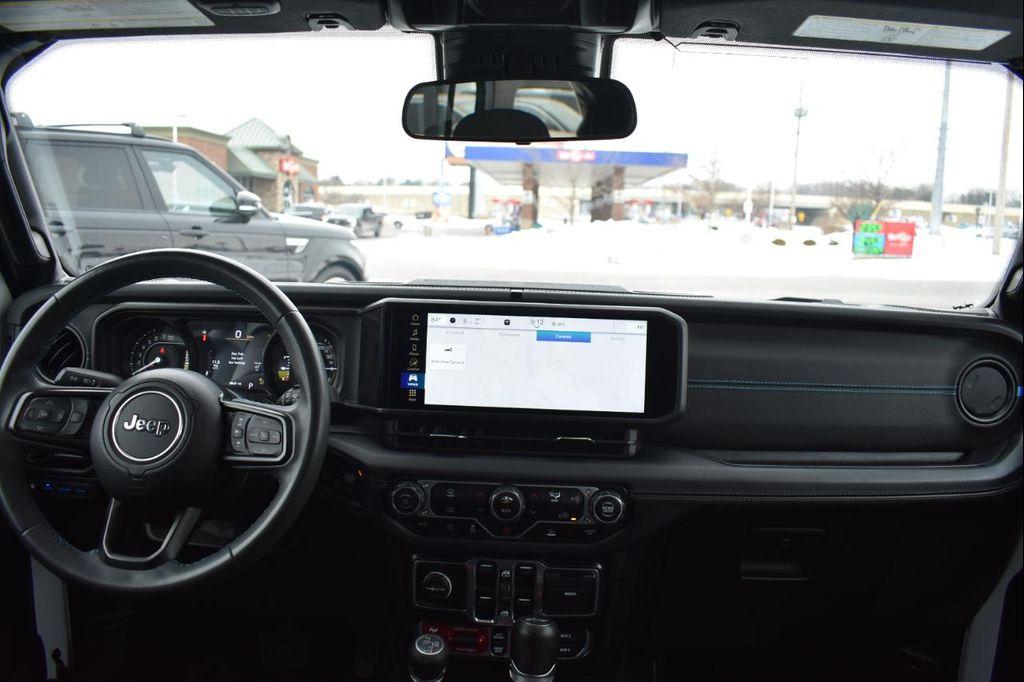 used 2024 Jeep Wrangler 4xe car, priced at $29,497