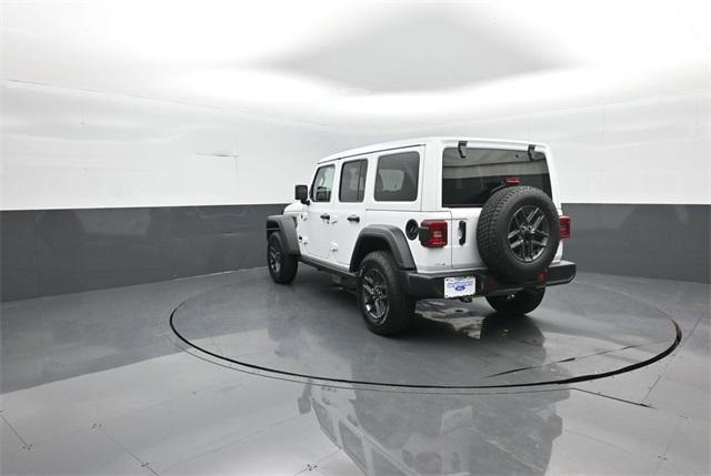 used 2024 Jeep Wrangler car, priced at $33,609