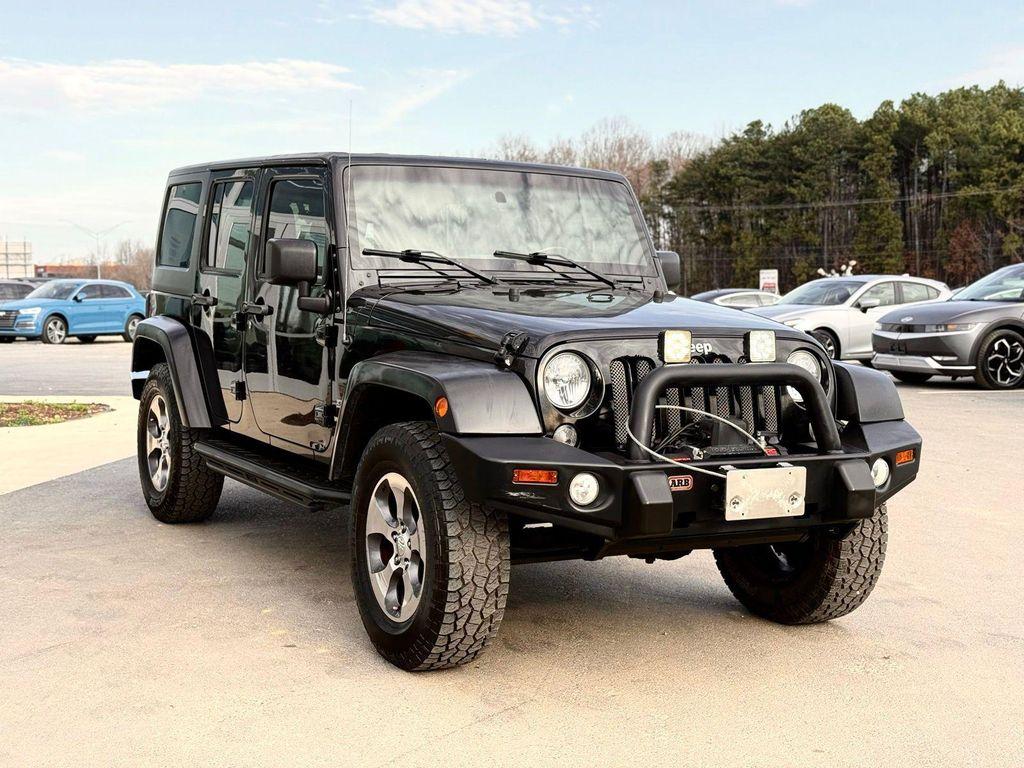 used 2015 Jeep Wrangler Unlimited car, priced at $15,991