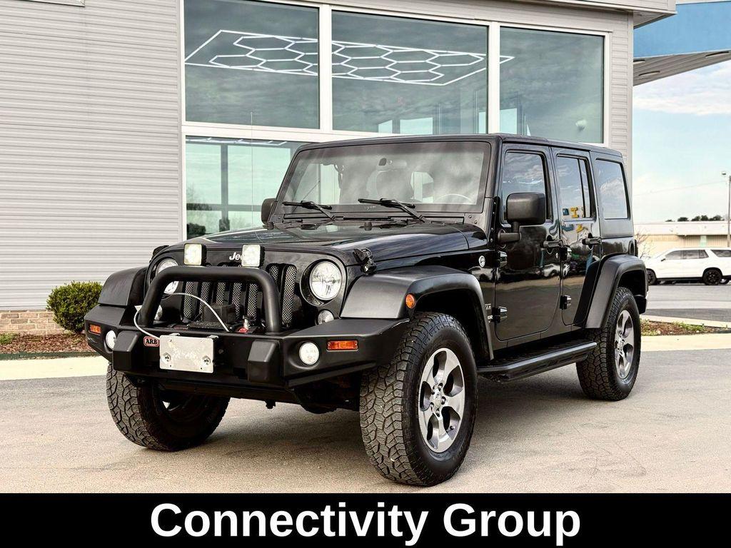 used 2015 Jeep Wrangler Unlimited car, priced at $15,991
