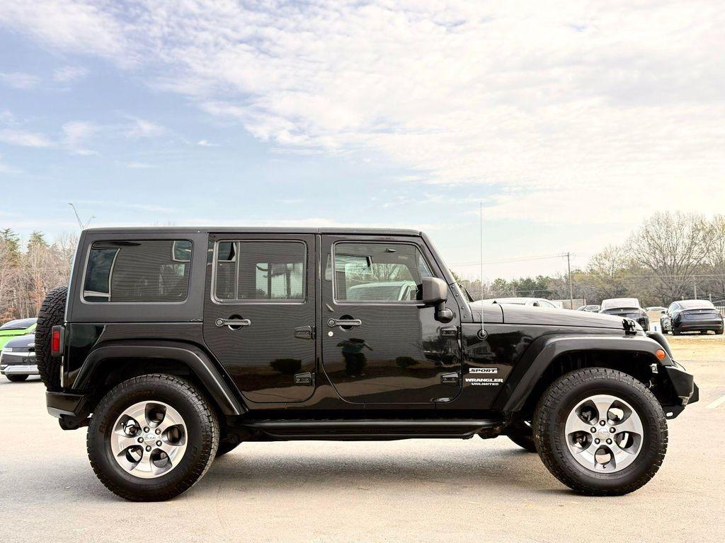 used 2015 Jeep Wrangler Unlimited car, priced at $15,991