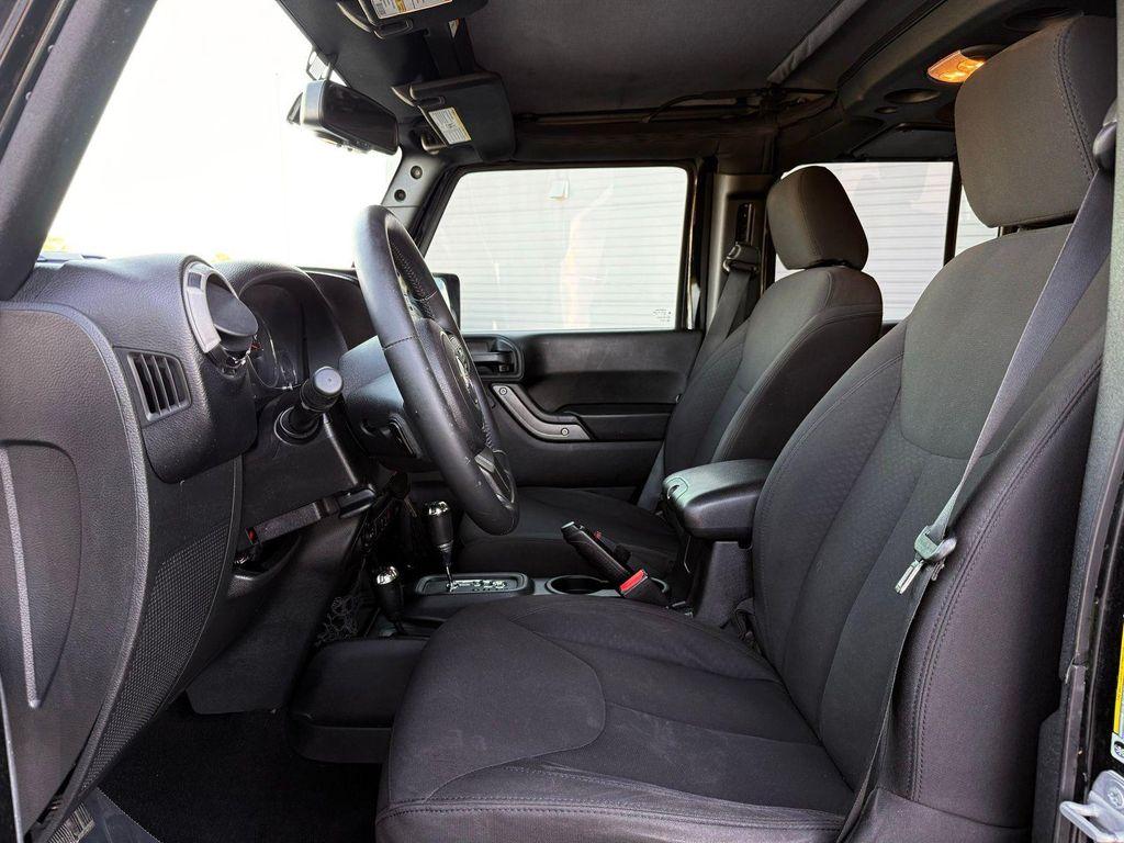 used 2015 Jeep Wrangler Unlimited car, priced at $14,791