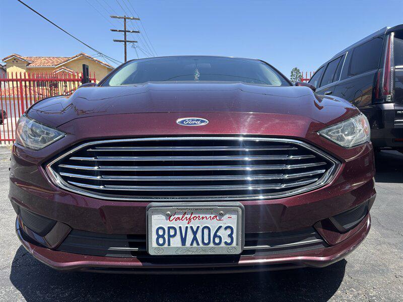 used 2018 Ford Fusion car, priced at $5,988