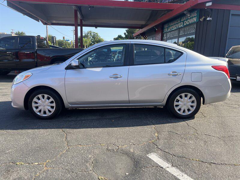 used 2013 Nissan Versa car, priced at $3,888