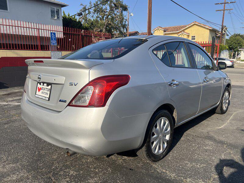 used 2013 Nissan Versa car, priced at $3,888