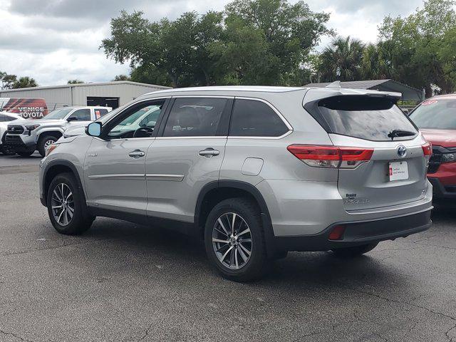 used 2019 Toyota Highlander Hybrid car, priced at $24,846