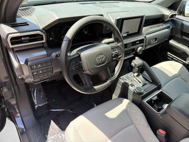 used 2025 Toyota Tacoma car, priced at $38,990