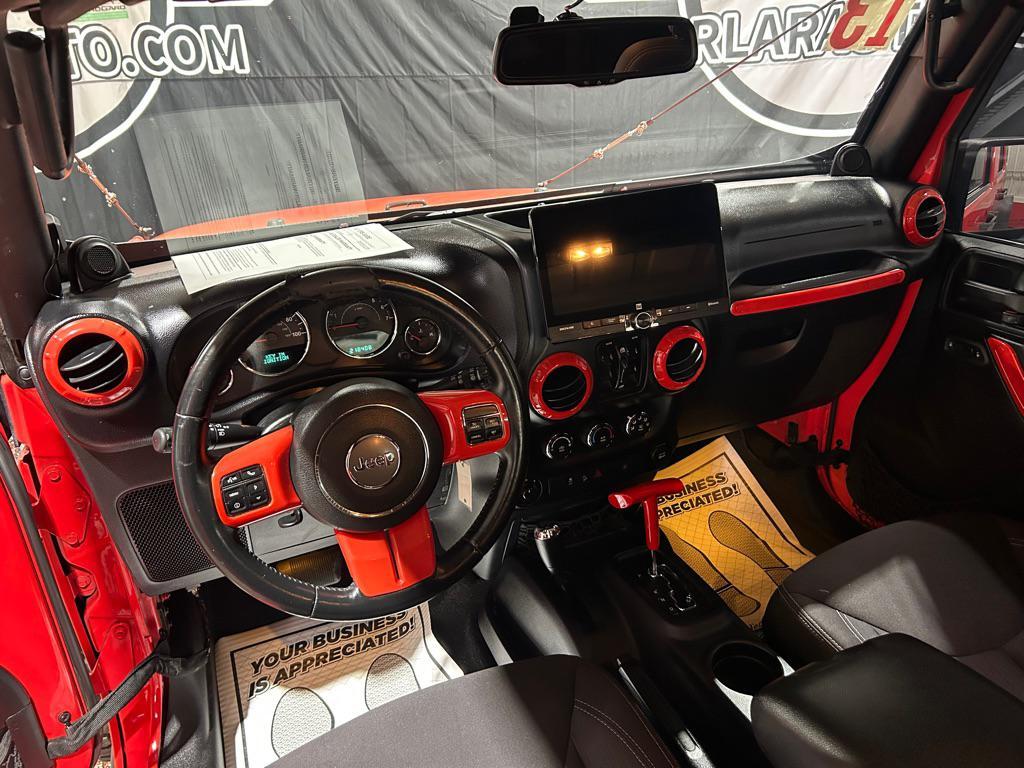 used 2013 Jeep Wrangler Unlimited car, priced at $12,990