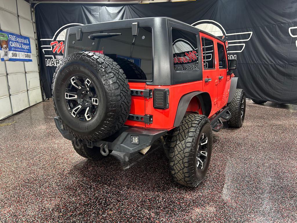 used 2013 Jeep Wrangler Unlimited car, priced at $12,990
