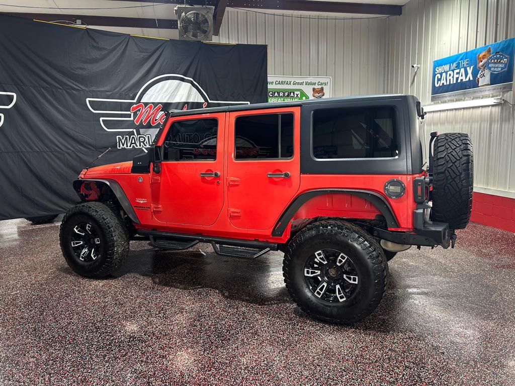 used 2013 Jeep Wrangler Unlimited car, priced at $12,990