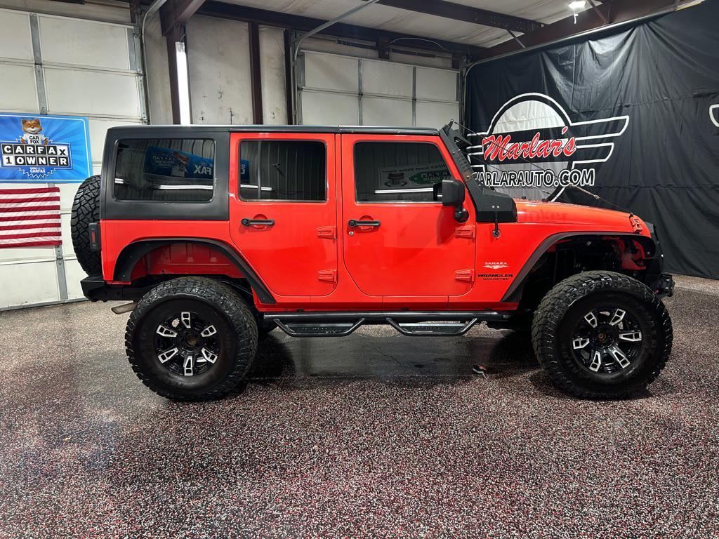 used 2013 Jeep Wrangler Unlimited car, priced at $12,990
