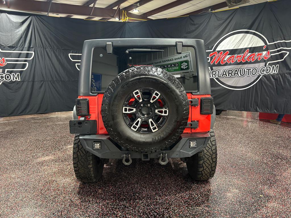 used 2013 Jeep Wrangler Unlimited car, priced at $12,990
