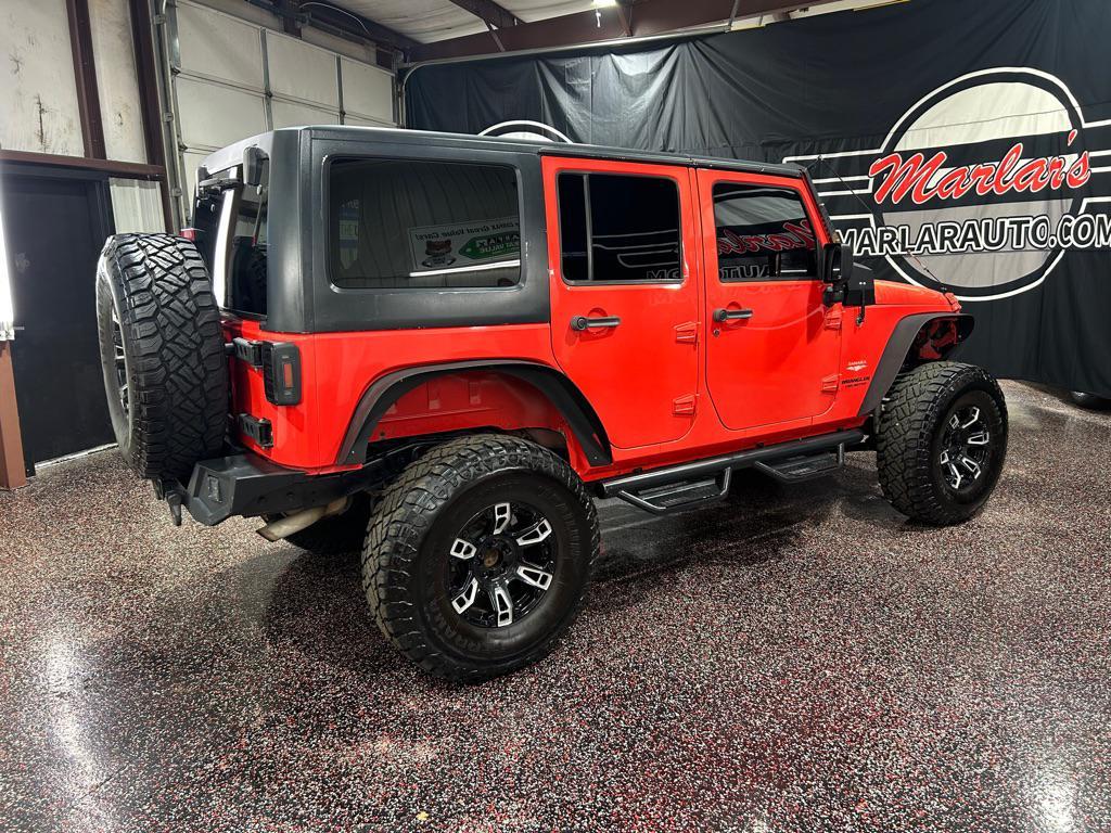 used 2013 Jeep Wrangler Unlimited car, priced at $12,990