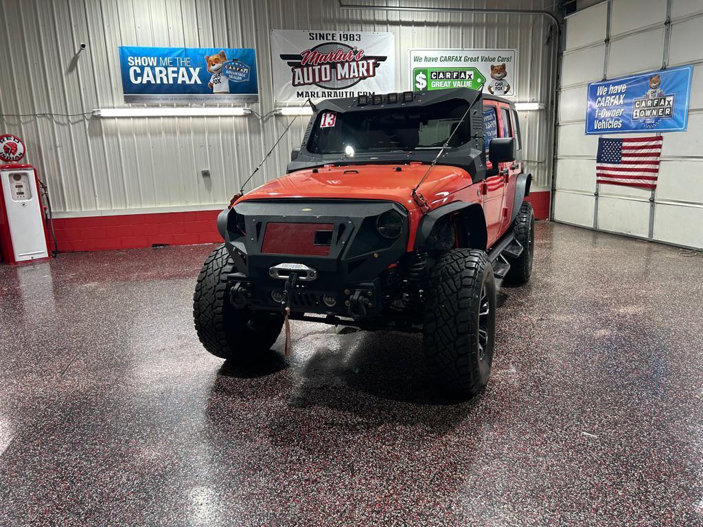 used 2013 Jeep Wrangler Unlimited car, priced at $12,990