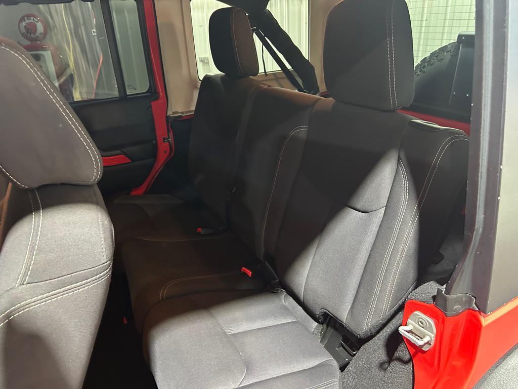 used 2013 Jeep Wrangler Unlimited car, priced at $12,990