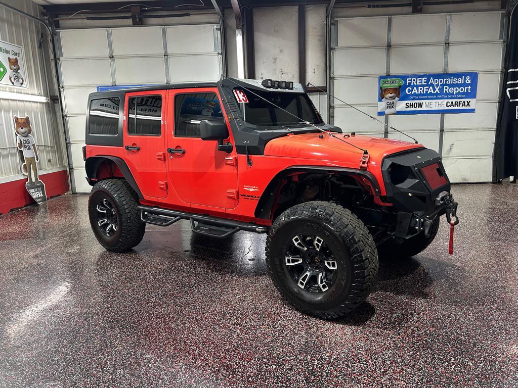 used 2013 Jeep Wrangler Unlimited car, priced at $12,990